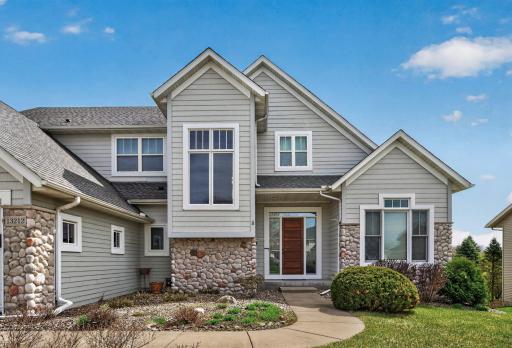 Striking entry door and clean architectural lines create a grand and inviting entrance to your home