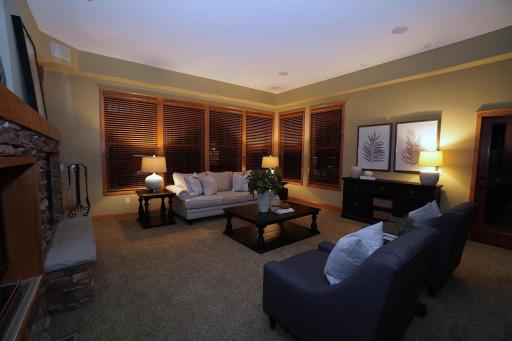 Evening elegance at its finest. Soft & warm feels with premium finishes and rich textures of this welcoming living room