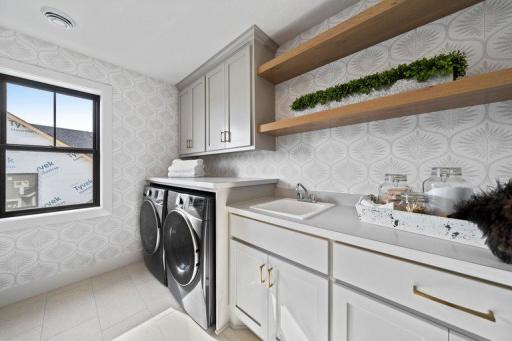 Photo of model home not all options may be included