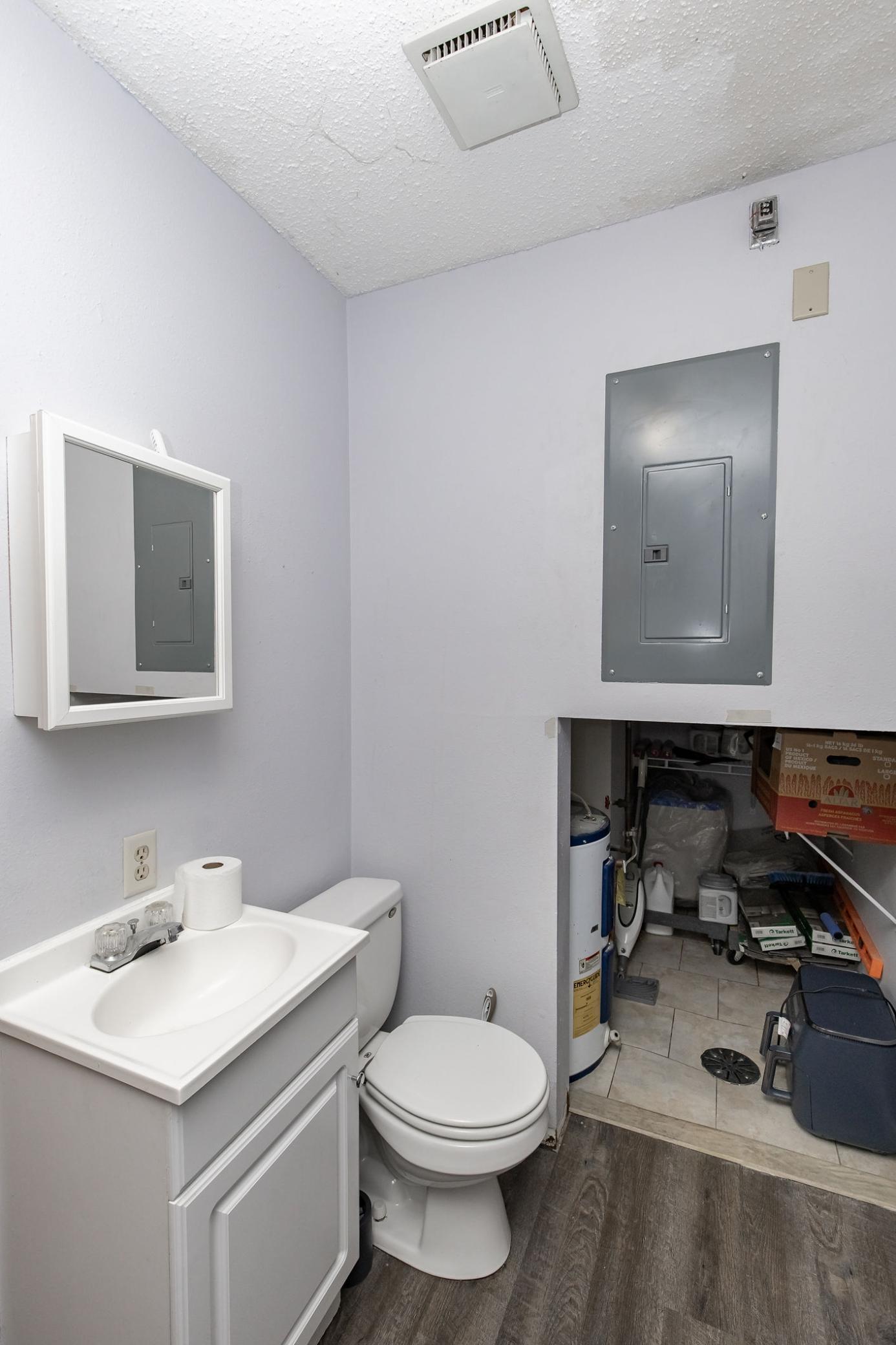 Laundry with half bath