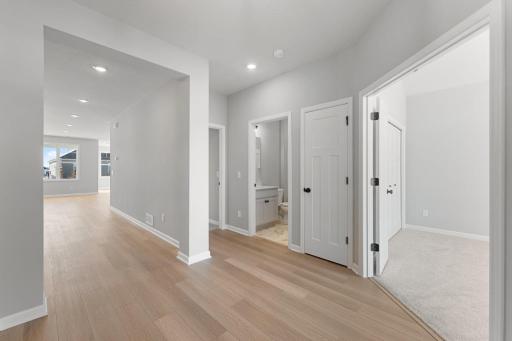 Two bedrooms at the front of the home that share a full bath