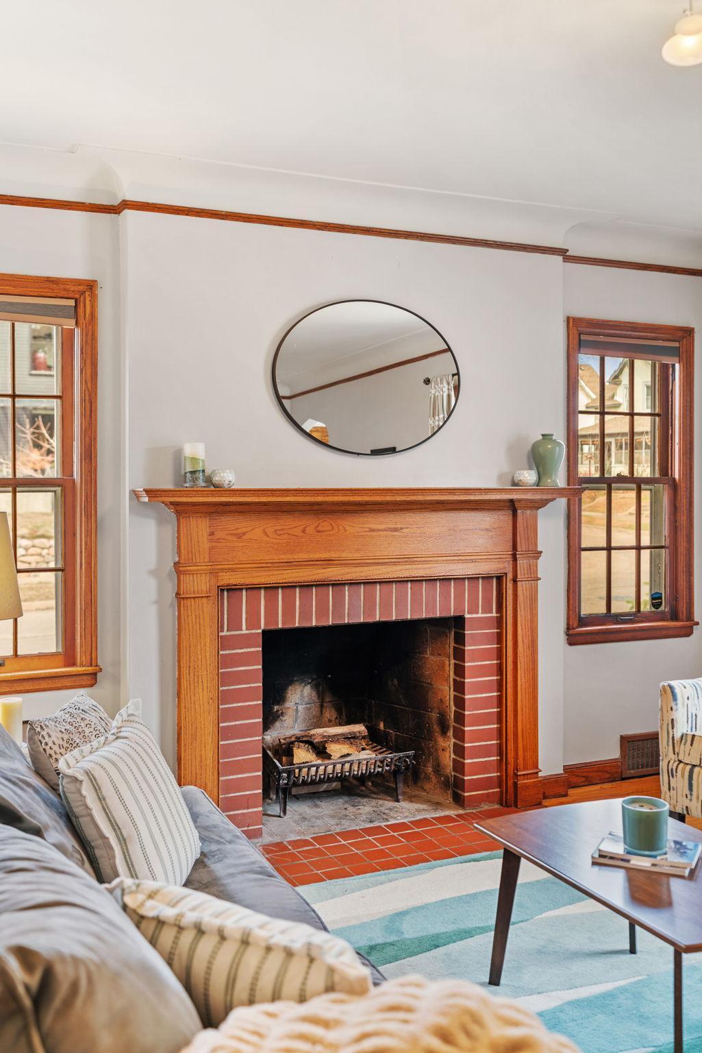 Fireplace has not been used and is a decorative element of the living room