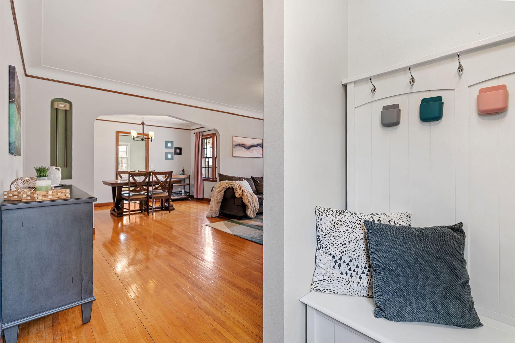 Front entry has a coat closet and bench with hooks