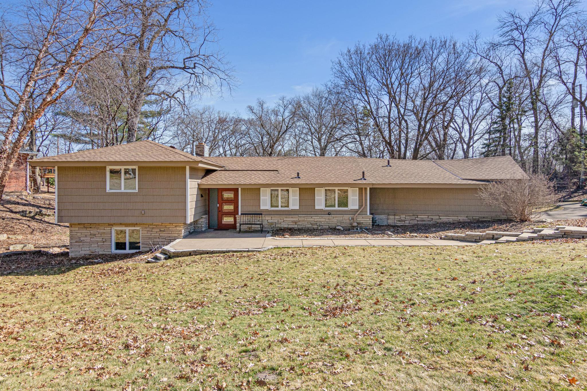 Opportunities like this don't come along often and this one is only available because of a relocation. Nestled in one of Minnetonka's most sought-after pockets.