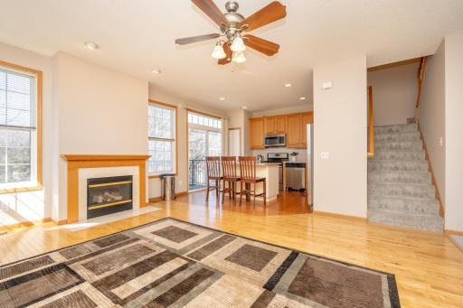 Open dining and kitchen with gas fireplace