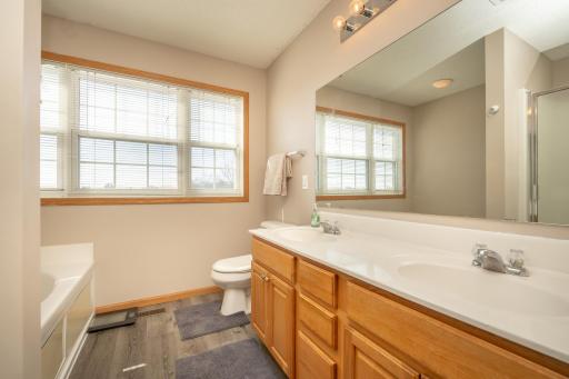 Primary bathroom (upper level) with soak tub