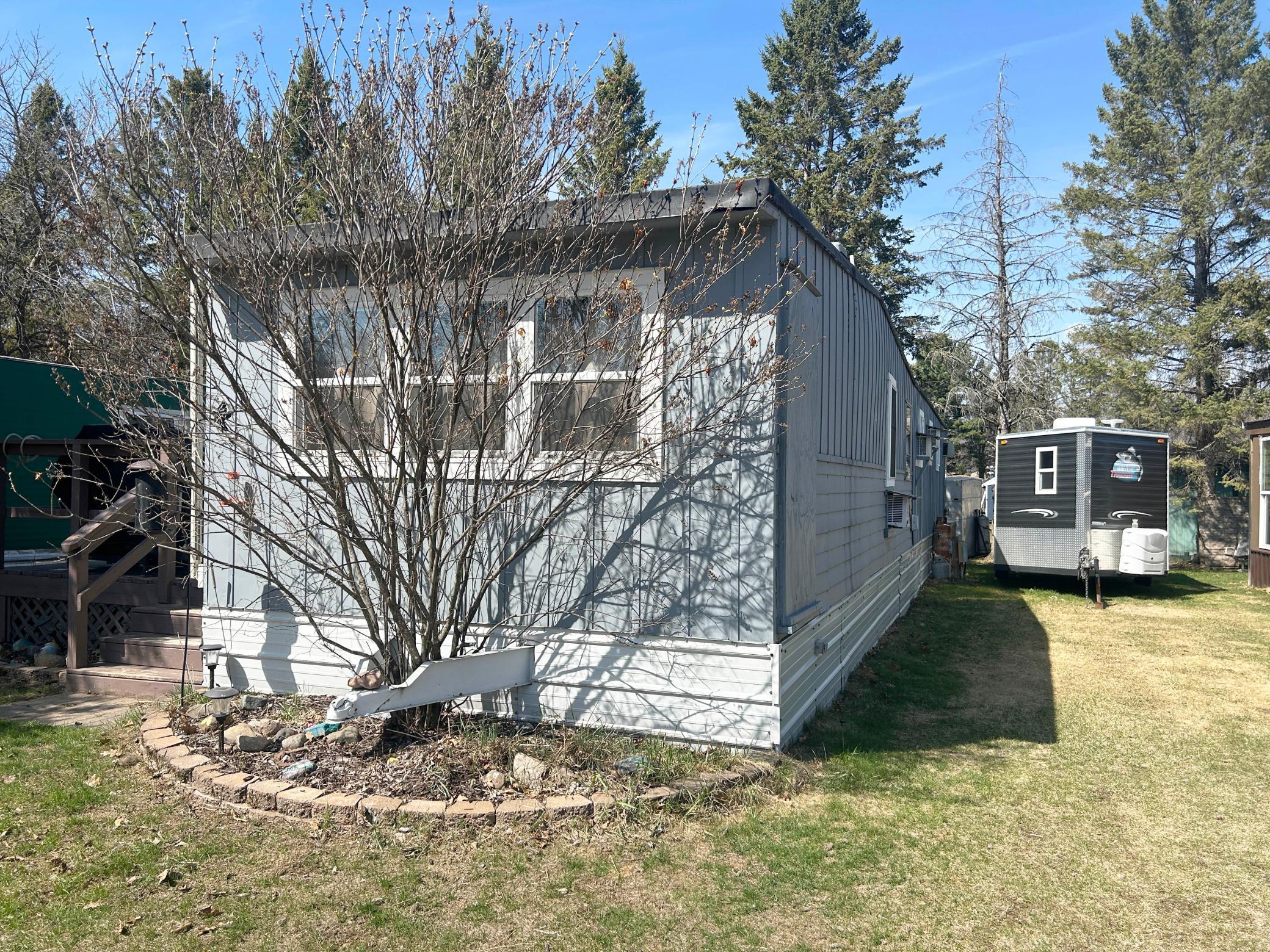 Another view of the home and other side of yard.
