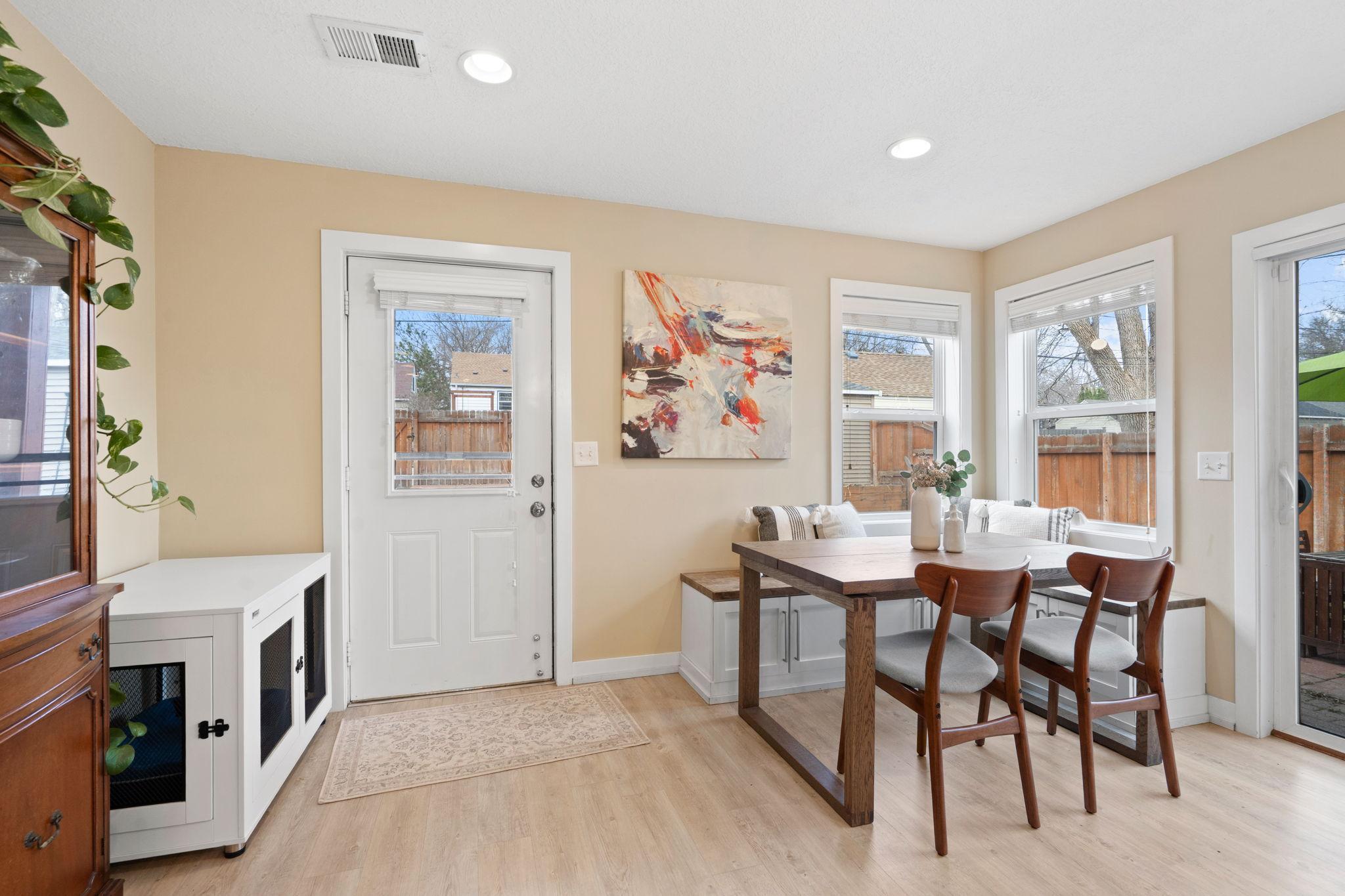 Eat-in kitchen with built in corner bench seating.