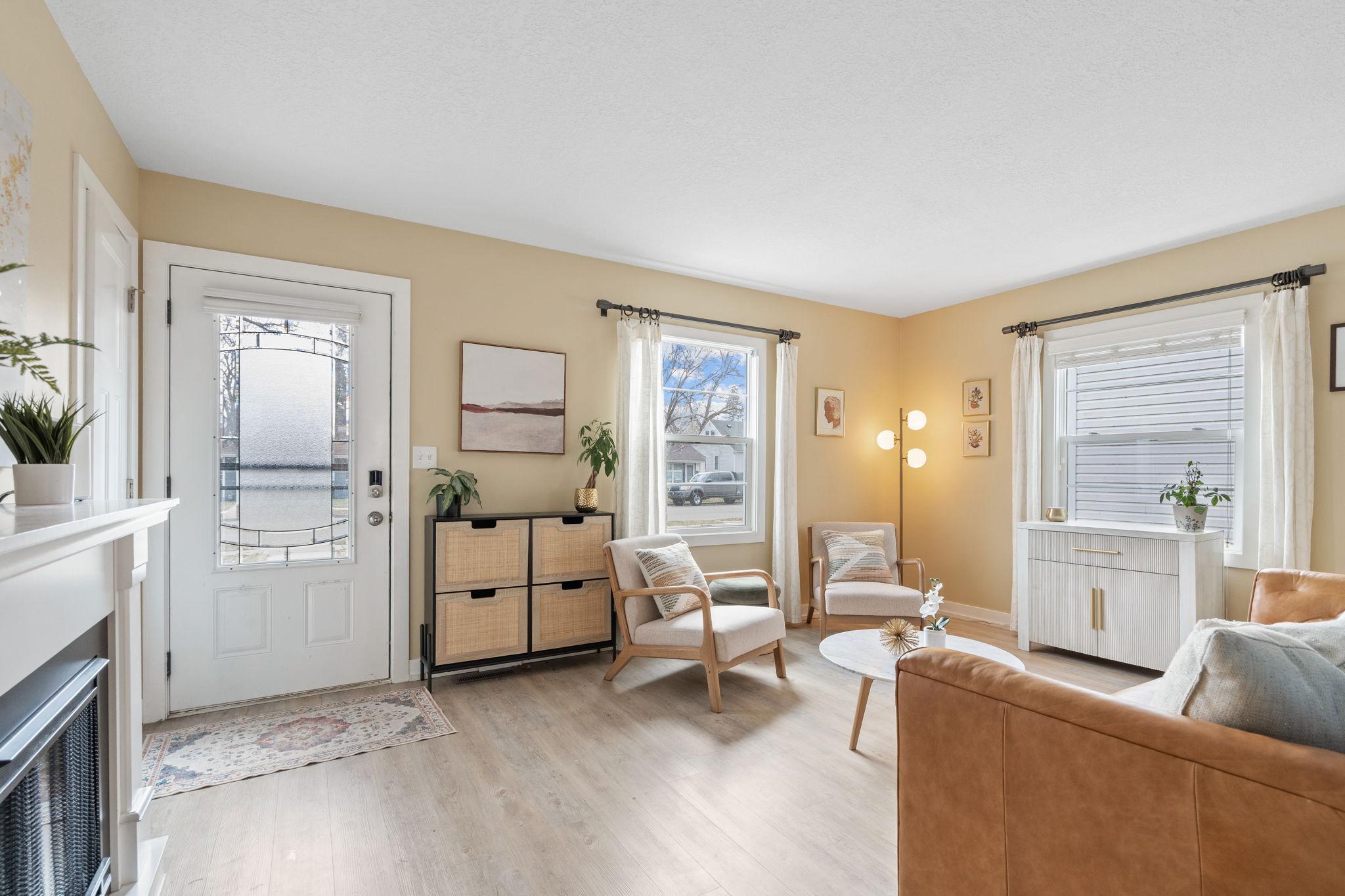 You can't help but smile when you step into this charming home!