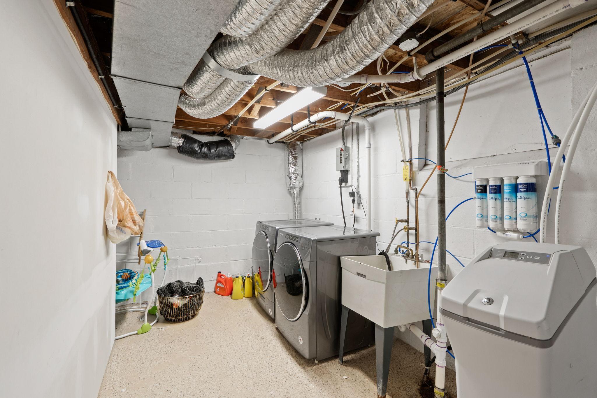 Lots of storage space in the unfinished side of the basement