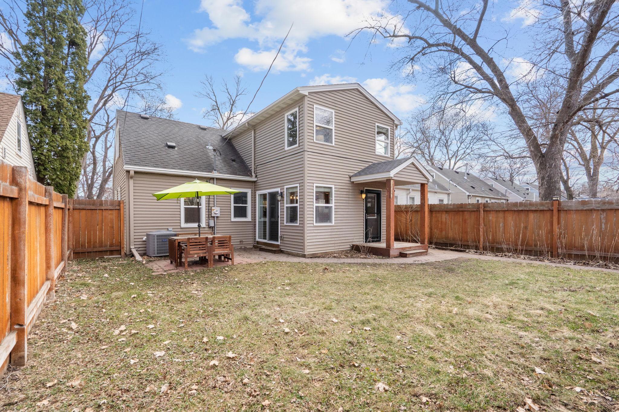 Fully fenced in backyard for privacy and convenient containment of 2 or 4-legged kids!
