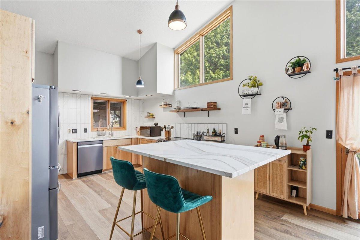 Additional seating at the kitchen center island.