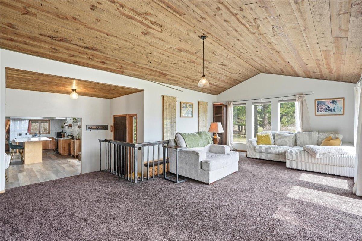 Living room leads to kitchen.