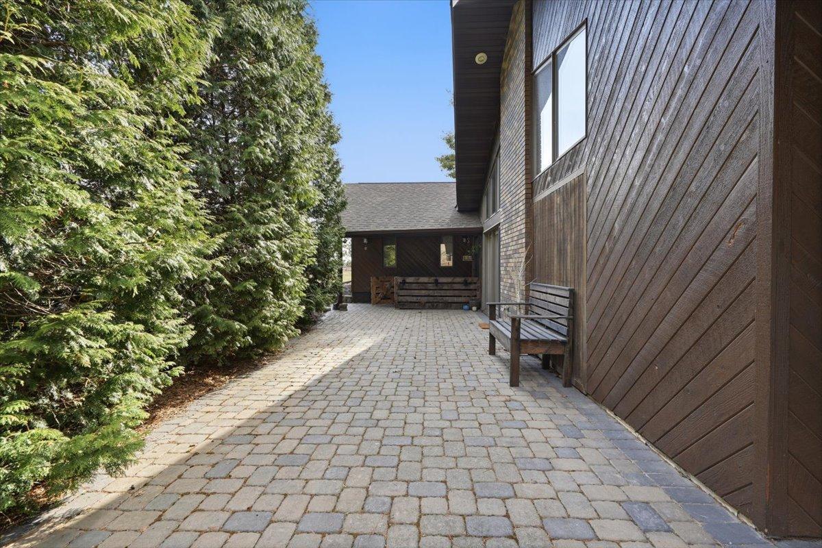 Ample patio space surrounds the home!