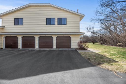 Single car garage with new door with front door around corner