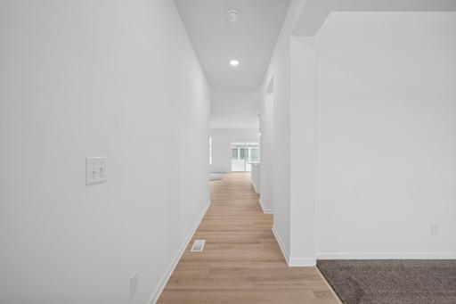 The entry with a study off to the side. Pictures are of a previous Pryor home.