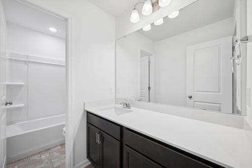 Secondary bath on the 2nd floor. Pictures are of a previous Pryor home.