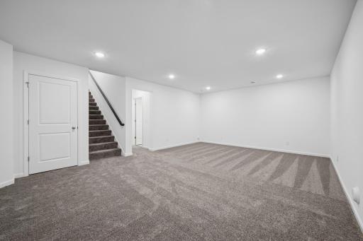 A finished - full basement complete with bedroom and bath! Pictures are of a previous Pryor home.