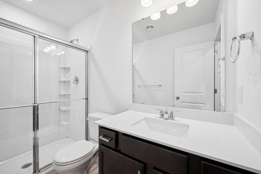 Basement bath. Pictures are of a previous Pryor home.