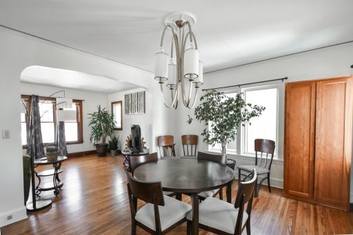 Dining room windows are new- lots of natural light, spacious and stunning hardwood floors.