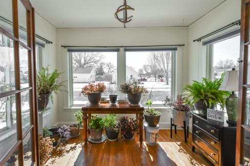 Tons of natural light flowing into the sunroom
