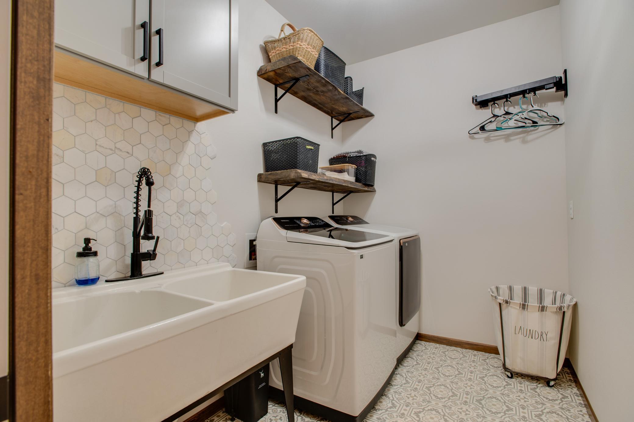Sizable Laundry room with storage & function