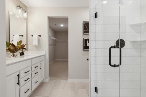 Generous vanity with ample counter space and under-sink storage provides both practicality and style, ideal for everyday routines..jpg