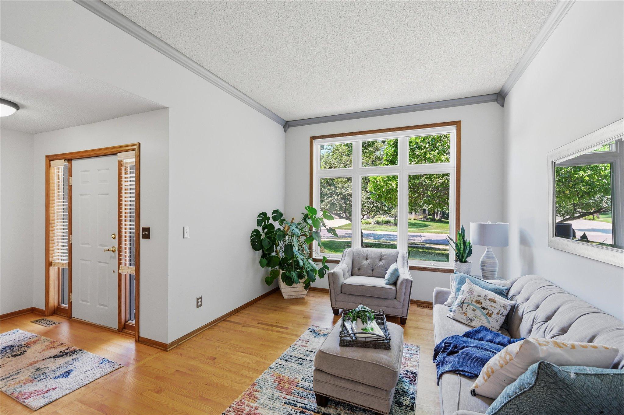 Large windows fill the home with natural light.