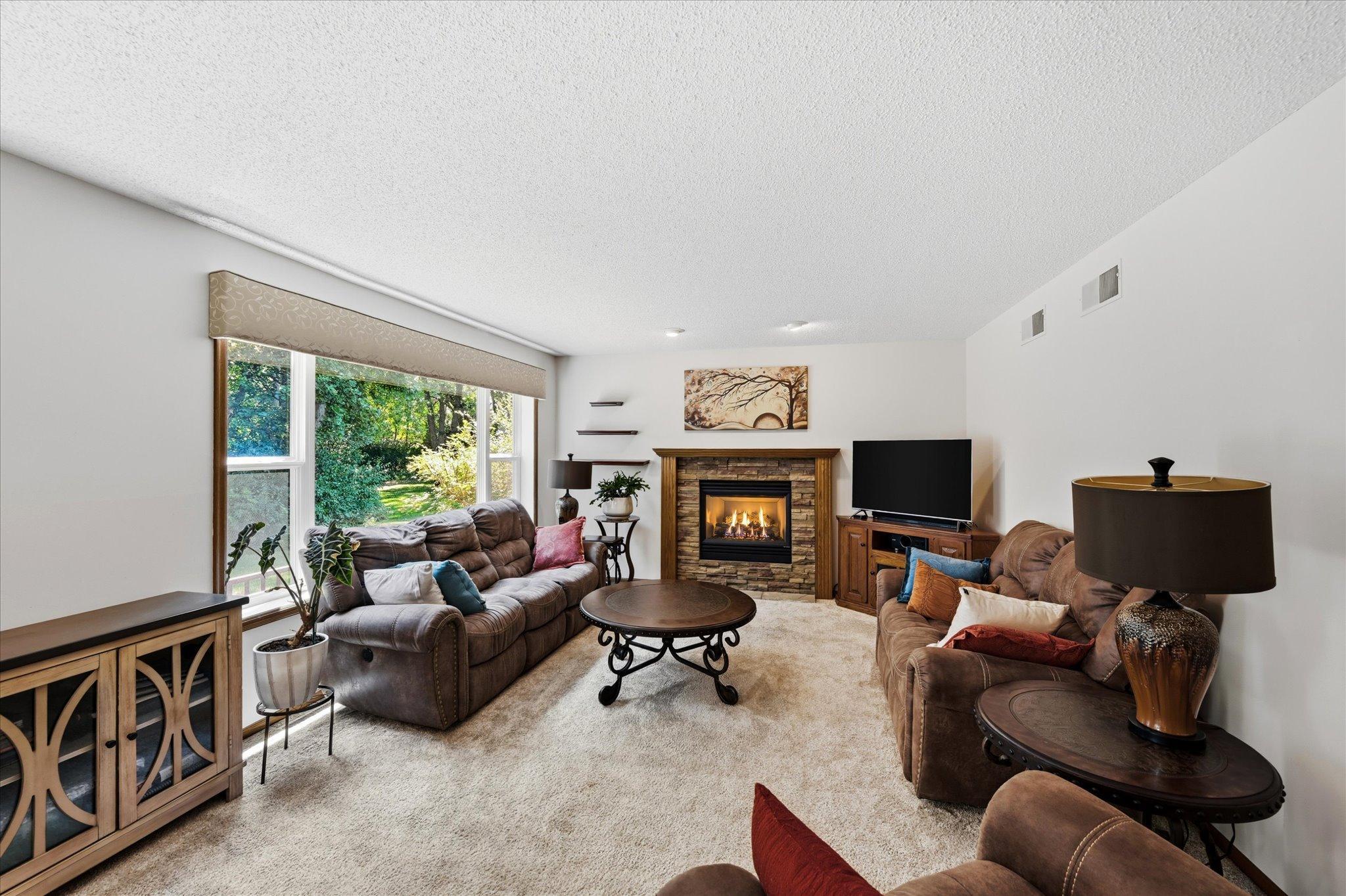 Comfortable gathering space with beautiful views of the backyard