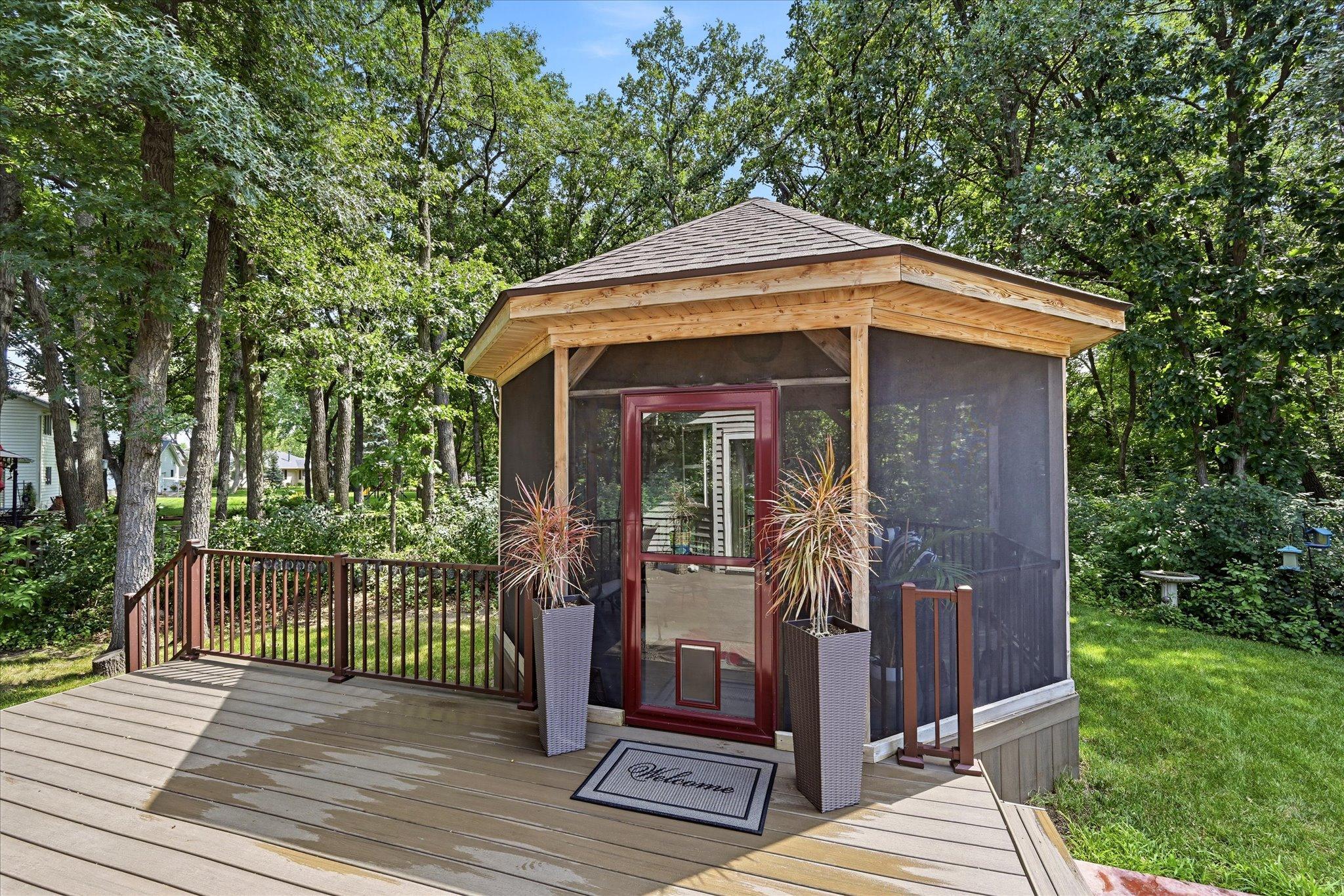 Relax bug-free in the screened cedar gazebo with charming solar lighting