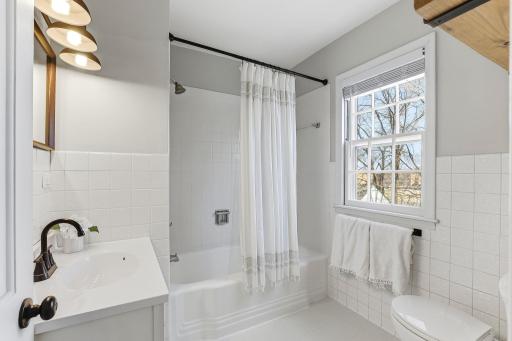 Bright upper-level full bath with a clean, timeless design