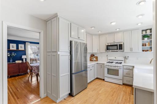 Bright, fully remodeled kitchen featuring modern finishes and thoughtful design. Showcases sleek quartz countertops, back splash, NEW cabinetry , farmhouse sink âperfect for entertaining.