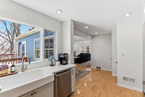 Defined layout with easy access to the informal dining area, formal dining room, and family roomâoffering functional flow with distinct living spaces.