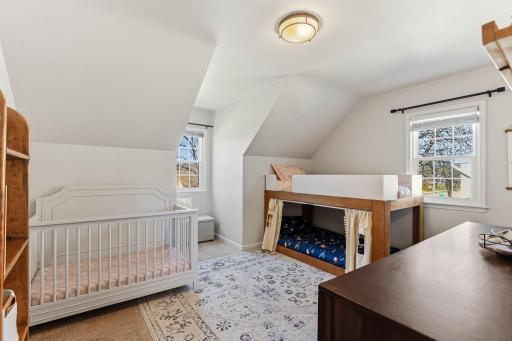 Well-appointed second bedroom on the upper level offering privacy and versatility.
