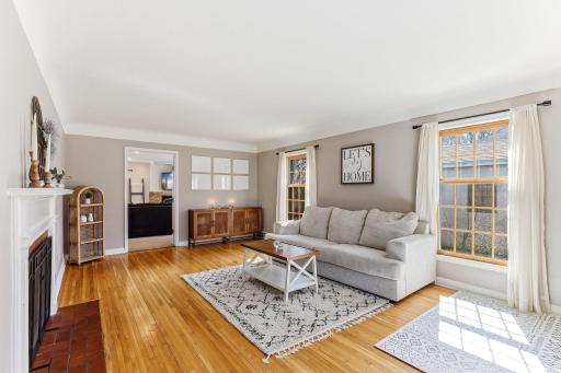 Beautifully preserved hardwood floors highlight the homeâs original craftsmanship and charm