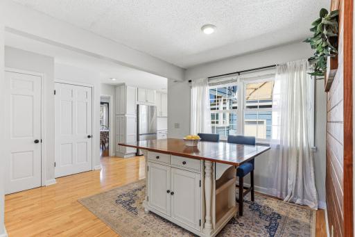 Enjoy relaxed dining in this informal area, filled with natural light and easy access to the kitchen for effortless serving.