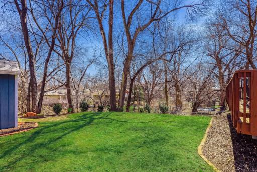 Fully fenced yard offering privacy, security, and ample space for outdoor enjoyment.