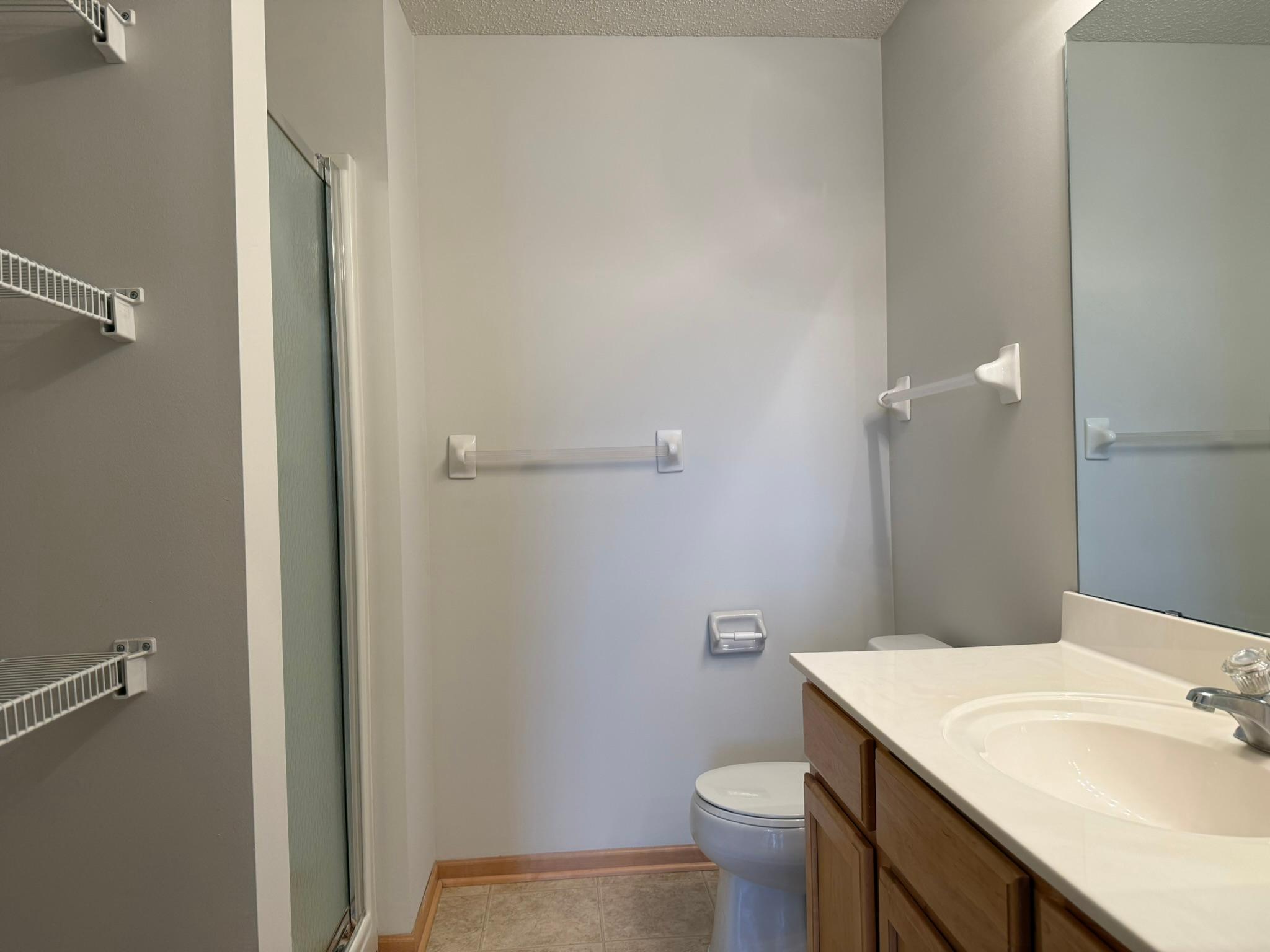 Private primary bath with more storage!