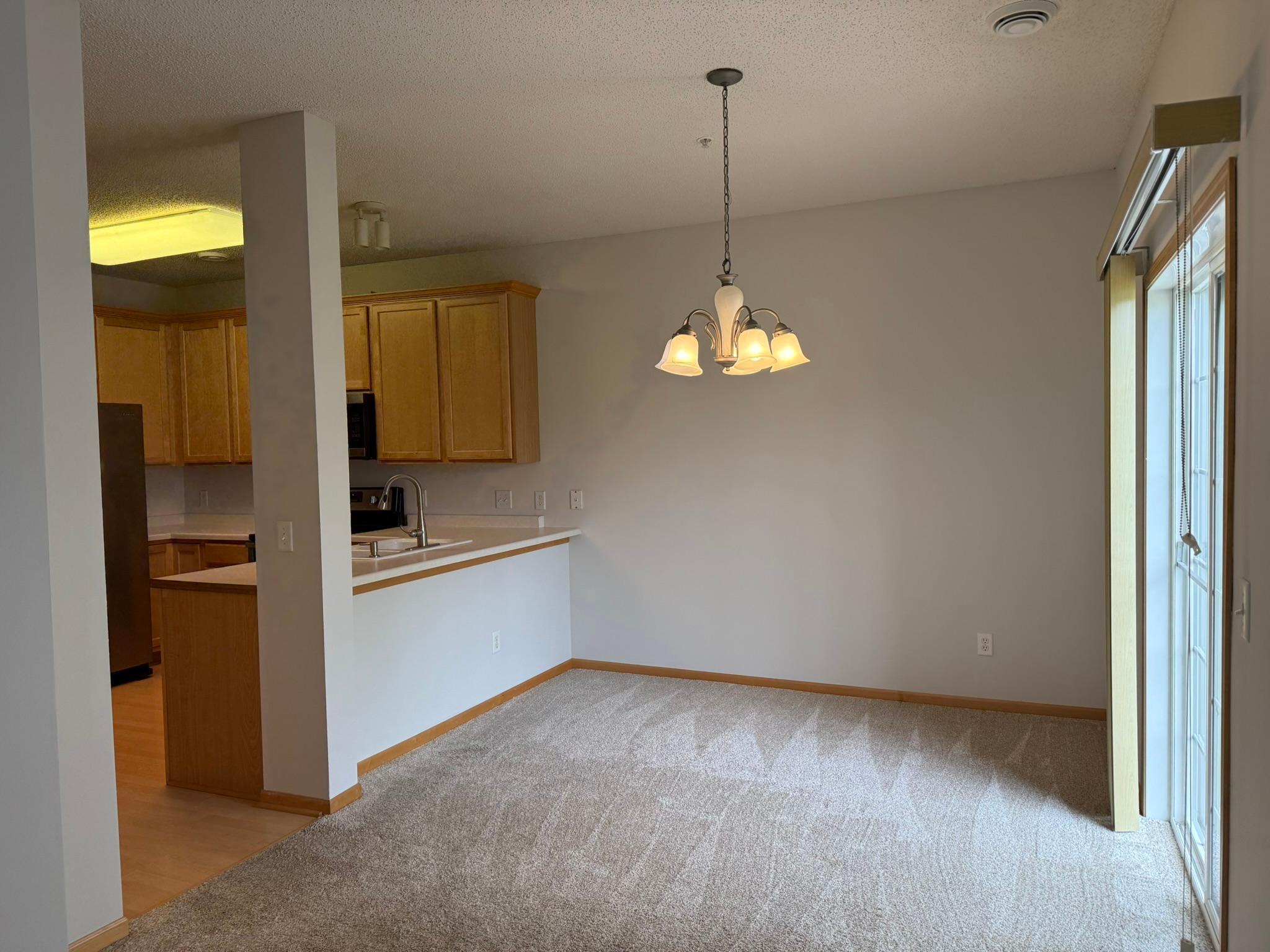 Dining room with sliding door to patio overlooking the beautiful open yard