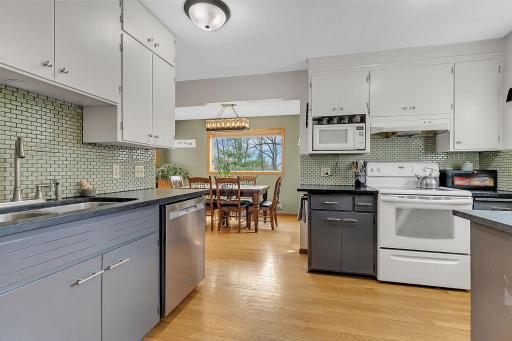 The kitchen holds vintage charm while still maintaining a functional workflow and ample storage.