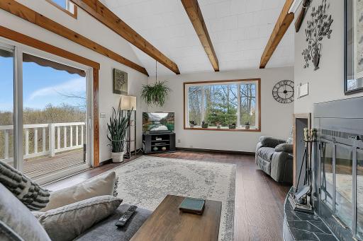 Enjoy the tree-lined setting year round through the expansive picture windows.