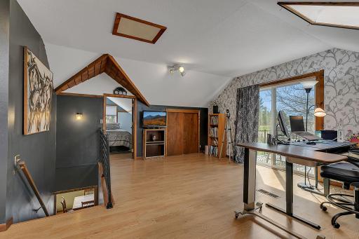 The upper level is an absolute retreat. With a bedroom, a bonus room, a 3/4 bathroom, and a private balcony, this primary suite is bound to impress you.