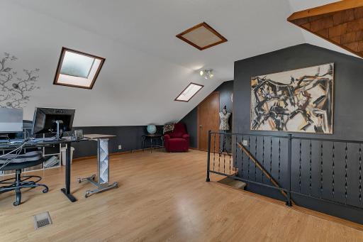 Upper level bonus room or loft space is perfect for an office, library, craft space, or your own lounge.