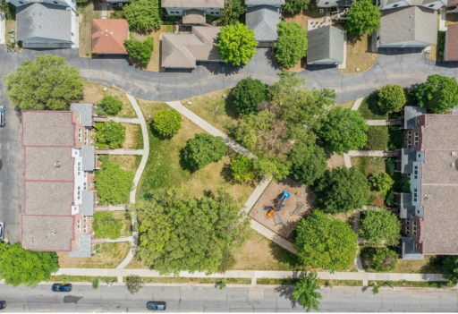 Ariel view of property and association shared park in center
