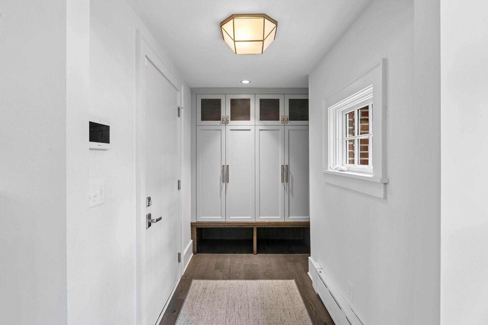 Just inside the garage door, a new mudroom was added with lockers and a bench.