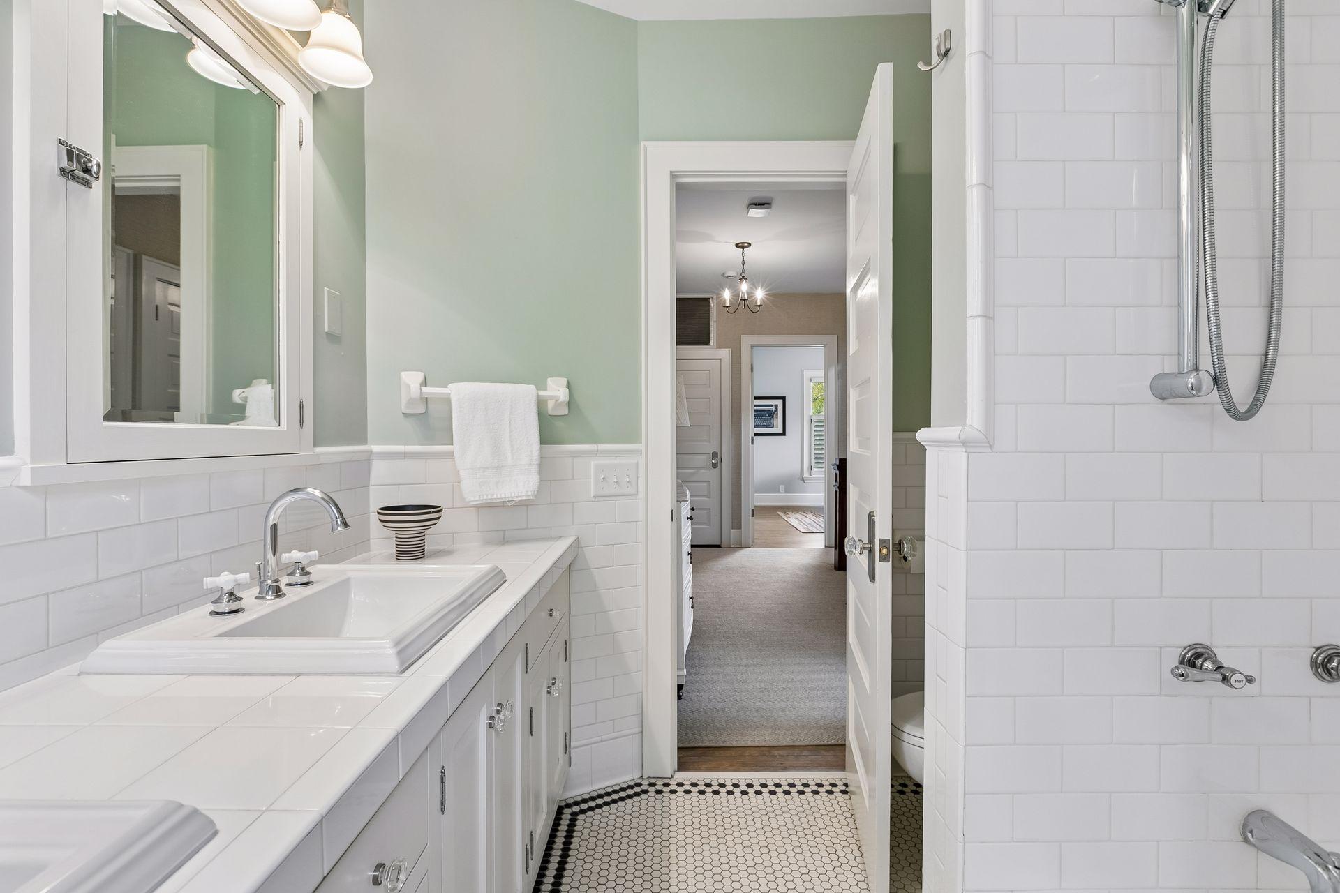 Full bathroom with a tub and shower