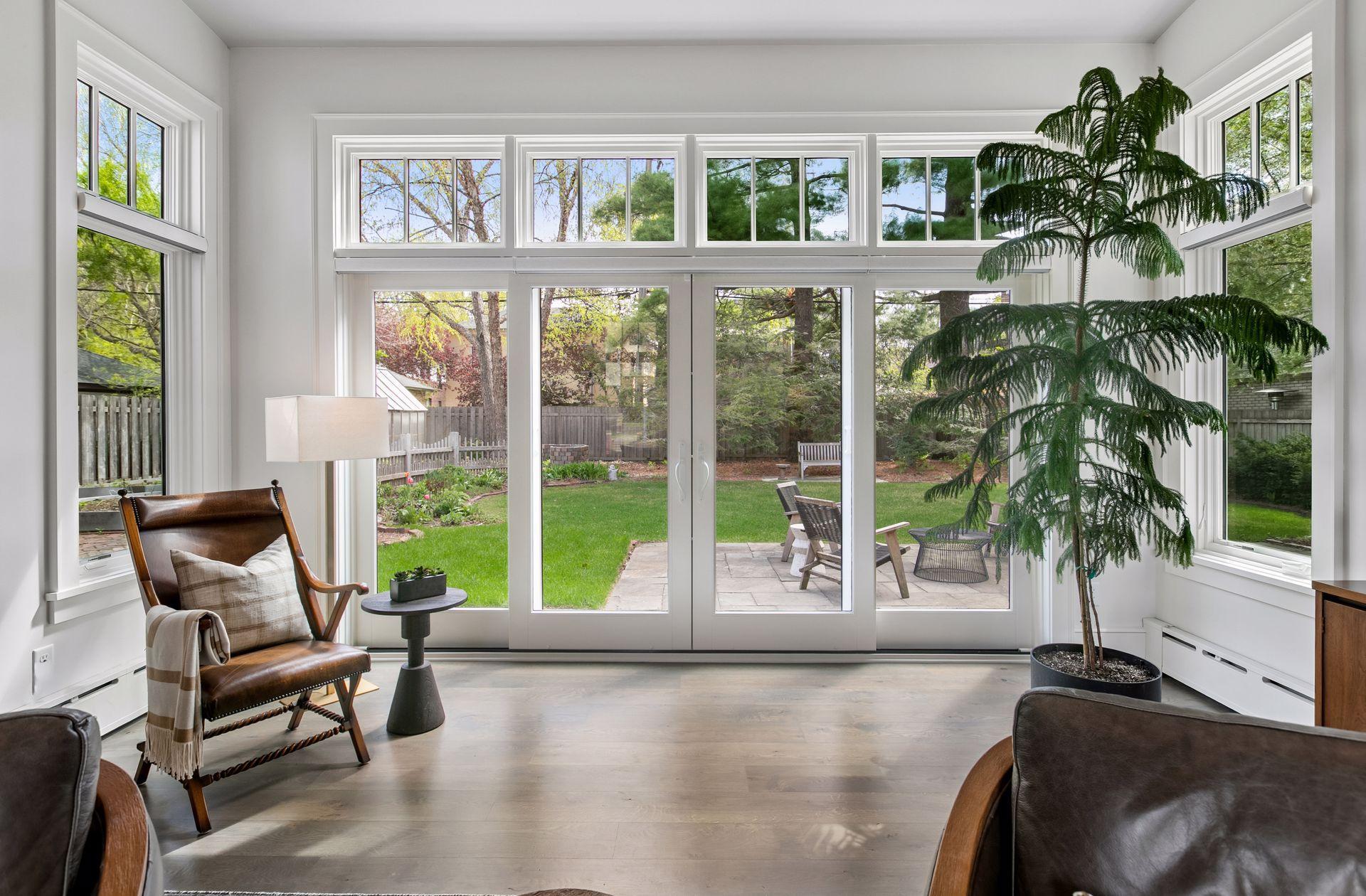 These new windows, sliding doors and phantom screens provide natural light and an easy transition to the yard and patio.