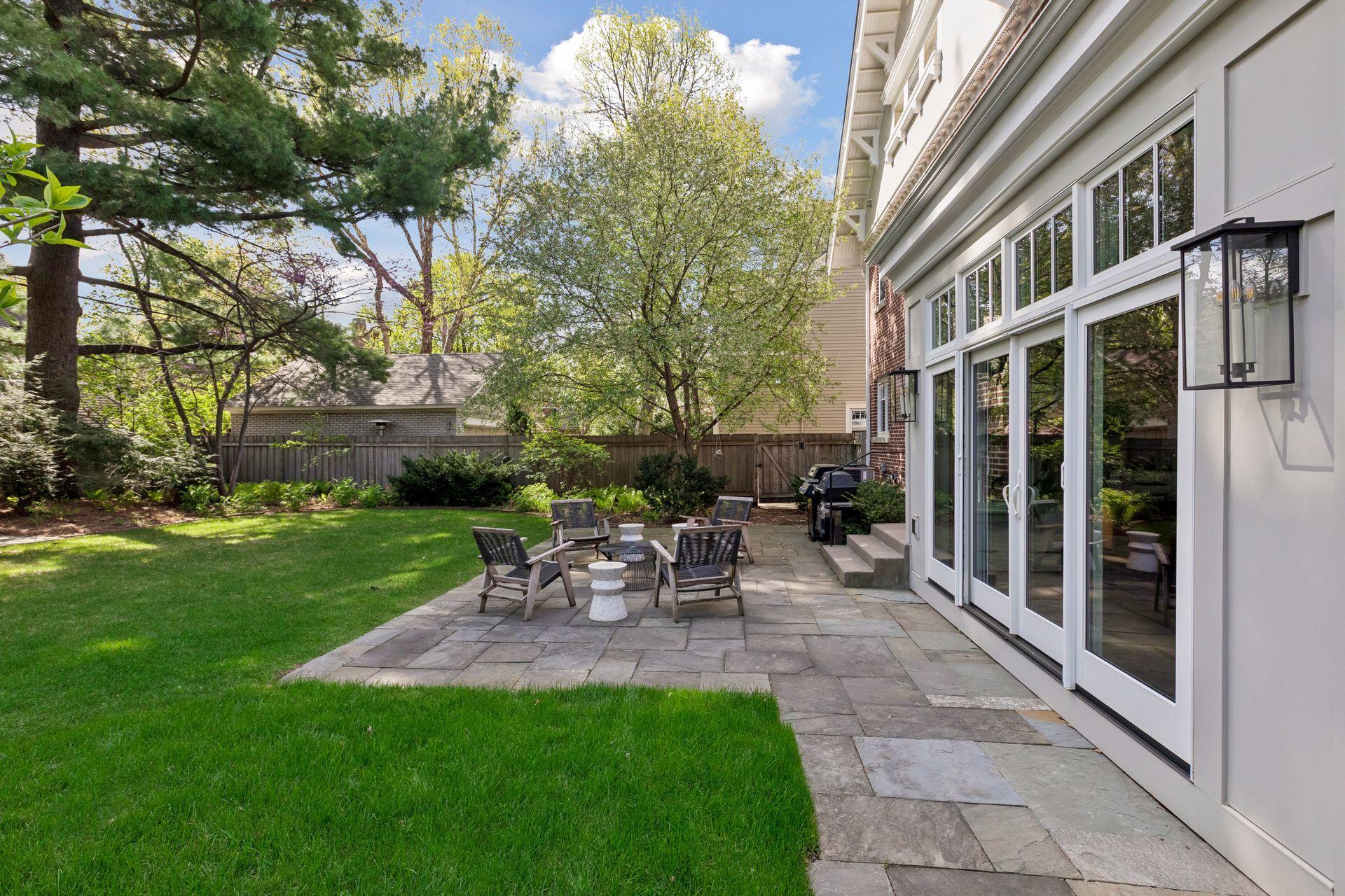 Very private and quiet yard. New windows and sliding doors bring you to the Blue stone patio. Entertain friends and family!