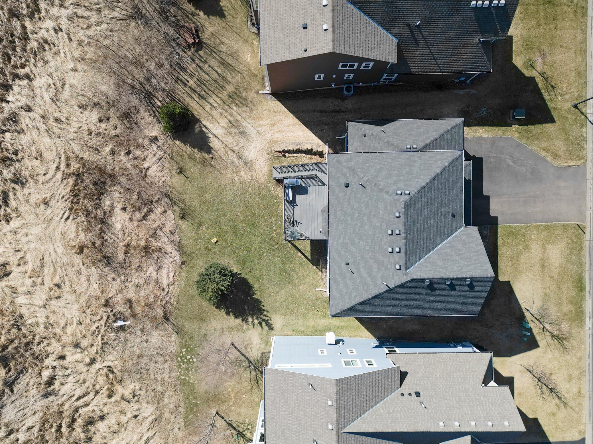 Thoughtfully positioned lot with open space behind, offering a sense of privacy and room to enjoy