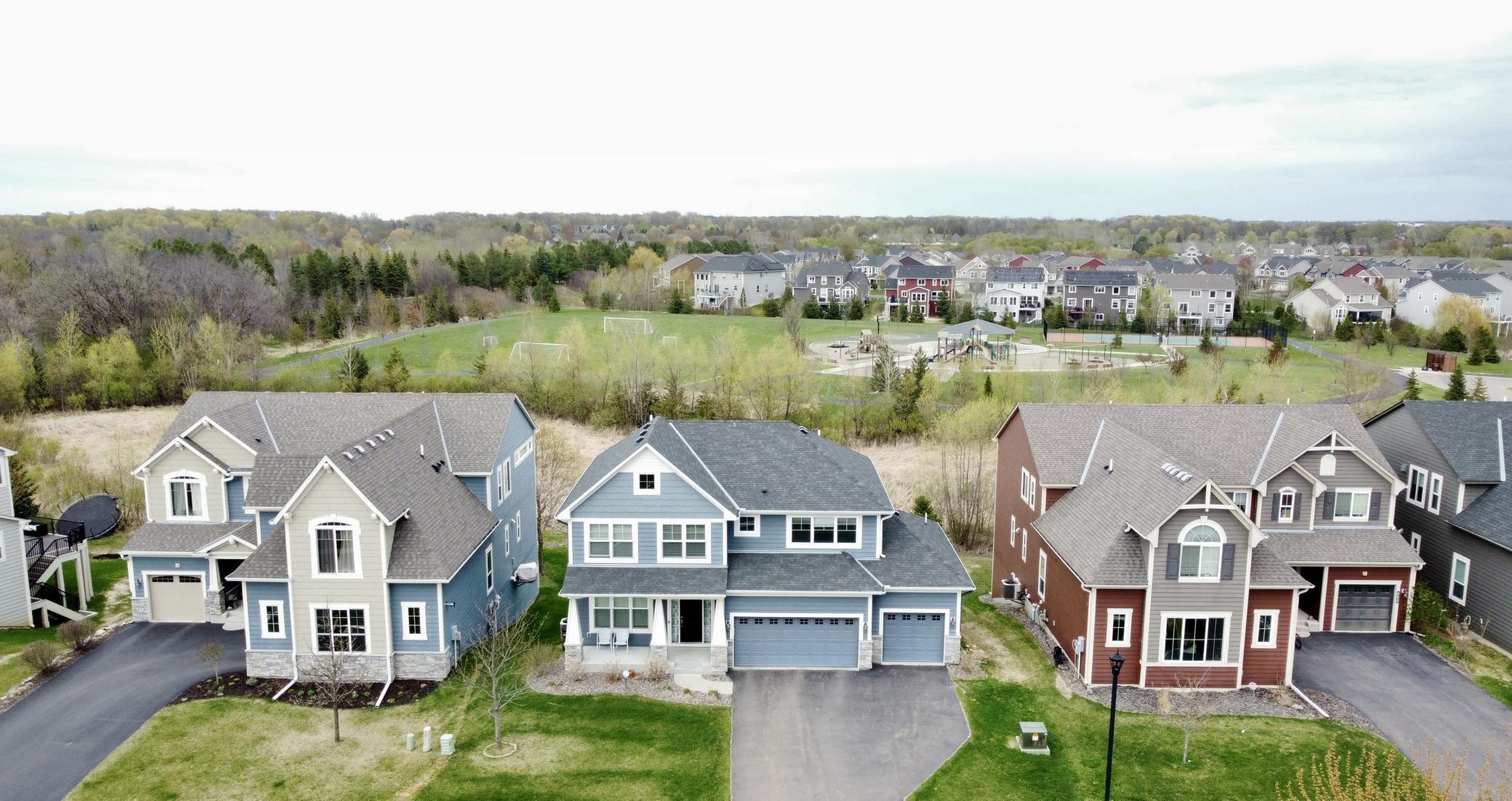 Overlooking scenic green space and neighborhood park, this home offers a connected yet peaceful setting